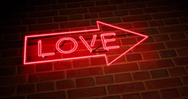 Neon Love Sign Boven Ingang Reclame Voor Nachtclub Massage Gloeiend — Stockvideo