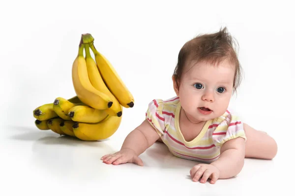Baby and banana — Stock Photo, Image