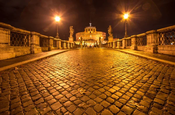 Saint Angel Castle and bridge over the Tiber river in Rome