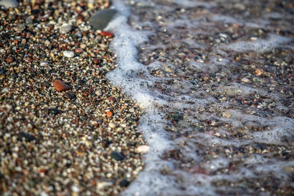 Apró kövek a tengerparton — Stock Fotó