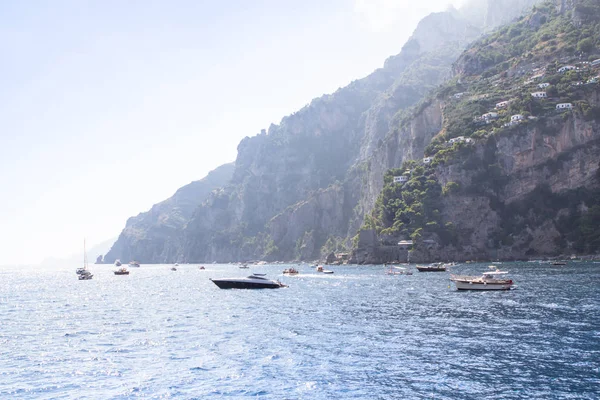Motor Boats in a bay between Amalfi and Positano, Italy