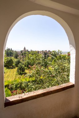 Stone arches in the world-famous Alhambra, Granada, Spain