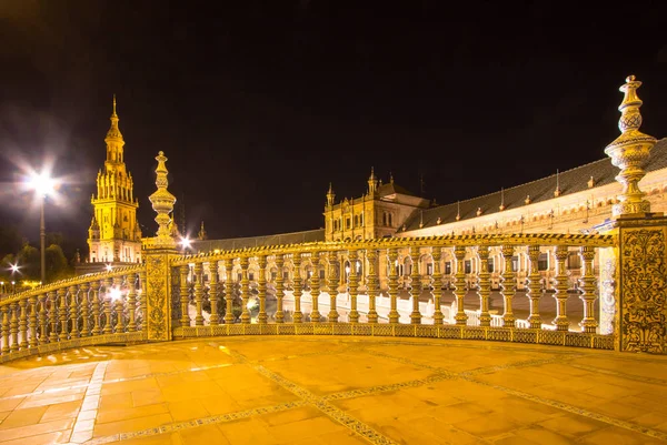 Night view of the bridges of Plaza de Espana, Seville, Spain — Stock Photo, Image