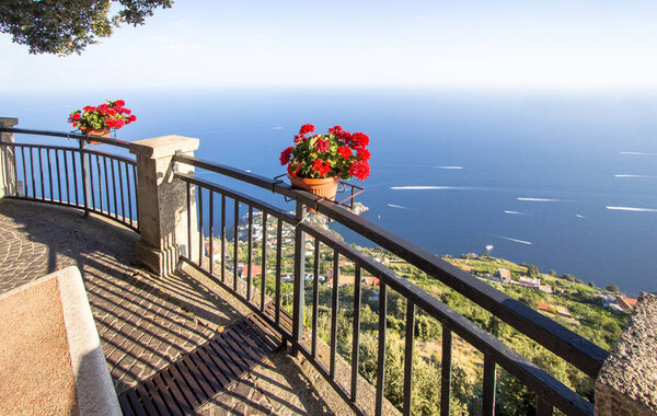 Flower pot on the viewpoint to the Amalfi coast, view from the Pogerola village, Italy