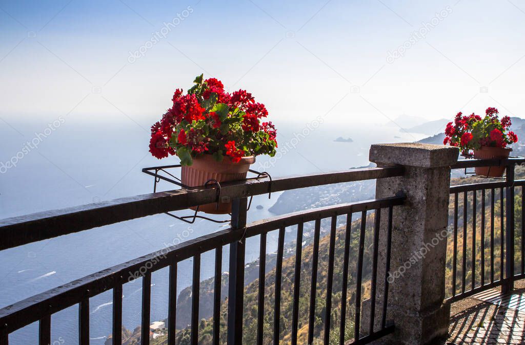 Flower pot on the viewpoint to the Amalfi coast, view from the Pogerola village, Italy
