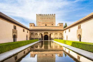 Beautiful courtyard of Alhambra Comares Patio, Granada, Andalucia, Spain clipart