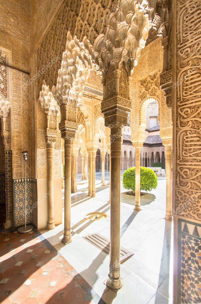 Beautiful arches in arabic style in courtyard of the Lions in the Alhambra Granada, Andalucia, Spain