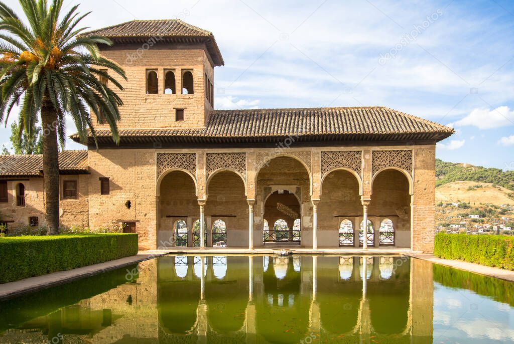 Ladies Tower (Torre de las Damas) and Gardens of the Portal at the Alhambra in Granada, Andalucia, Spain