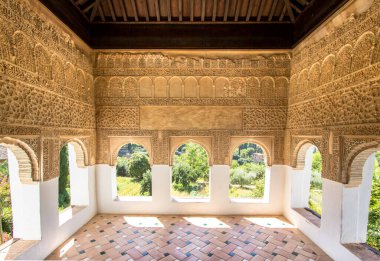 Stone arches in the world-famous garden of the Alhambra, Andalucia, Granada, Spain