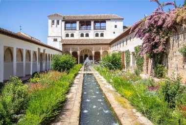Garden and fountain in patio de la Acequia La Alhambra, Granada, Andalucia, Spain