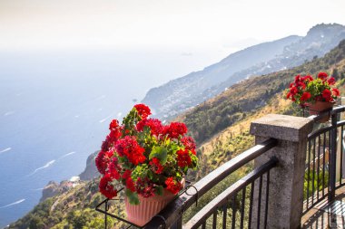 Flower pot on the viewpoint to the Amalfi coast, view from the Pogerola village, Italy