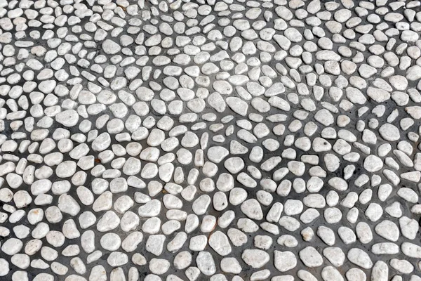 Runda stenar som bakgrund texxture — Stockfoto