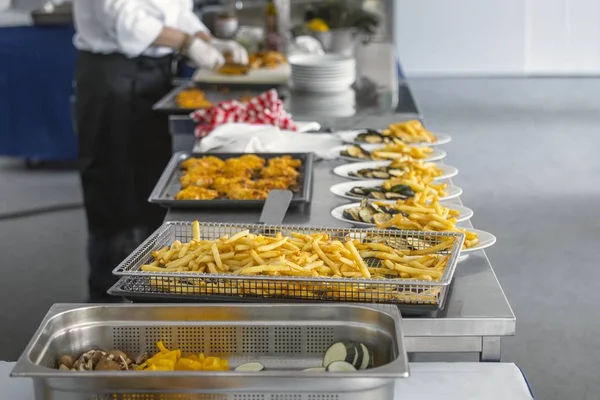 French fries and meat on the table — Stock Photo, Image