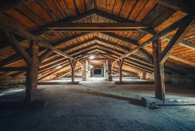 Creepy attic interior at abandoned building clipart