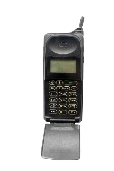 Teléfono viejo contra fondo blanco aislado —  Fotos de Stock