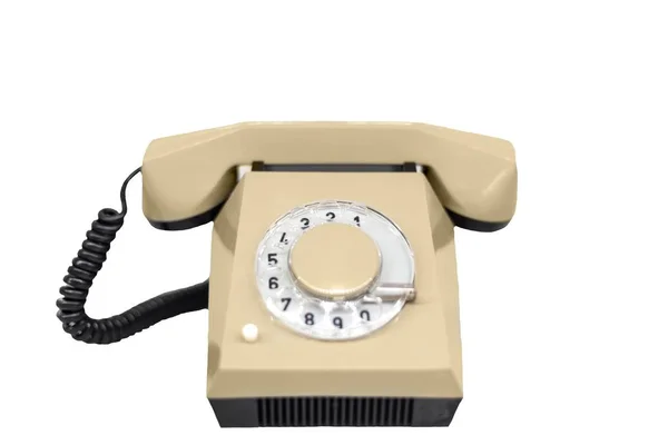 Altes Telefon vor weißem isolierten Hintergrund Stockbild