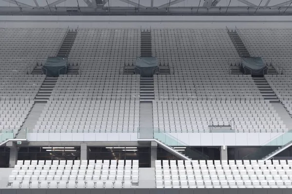 White seats in the large stadium — Stock Photo, Image