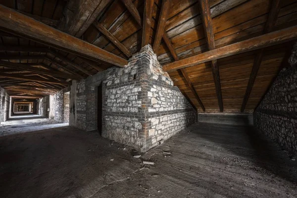 Creepy attic interior at abandoned building — Stock Photo, Image