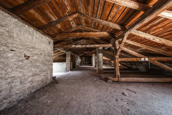 Creepy attic interior at abandoned building