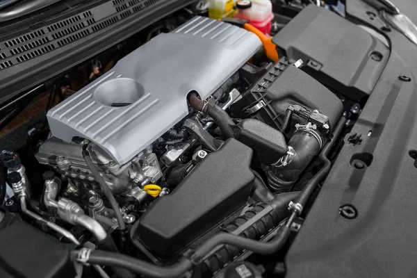 Detail photo of car engine under the hood — Stock Photo, Image