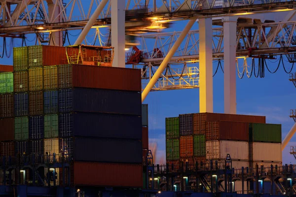 Large industrial port with cranes and cargo containers — Stockfoto