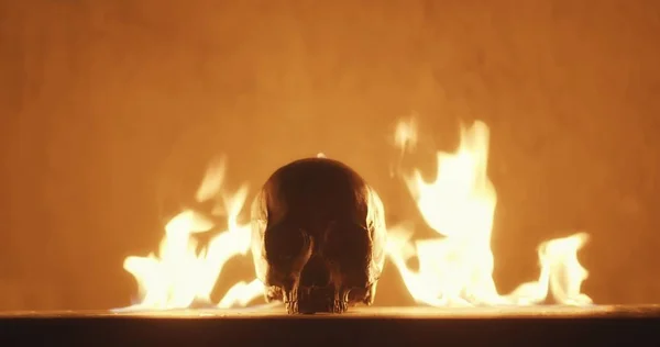 Burning human skull closeup photo — Stockfoto