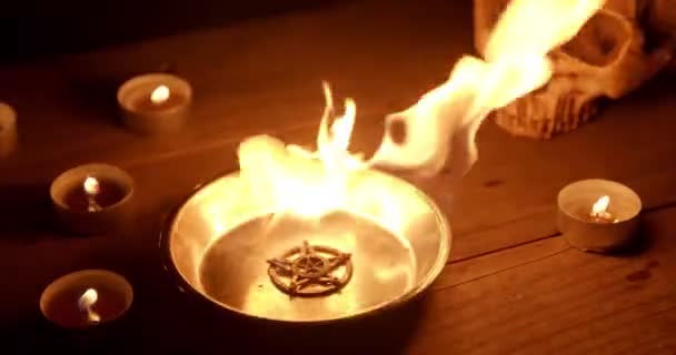 Burning pentacle on altar closeup footage — Stock videók