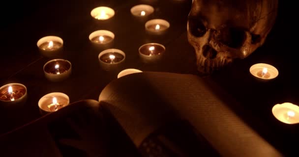 Altar with magical grimoire closeup footage — Stockvideo