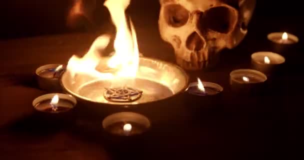 Burning pentacle on altar closeup footage — Stock video