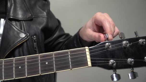 Man Puts Chords Large Shot Frame Fingers Finger Guitar — Stock Video
