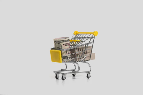 Boxes in a grocery basket on an isolated background. Ideas about online shopping as a form of e-commerce, allows consumers to buy goods from a seller through the Internet