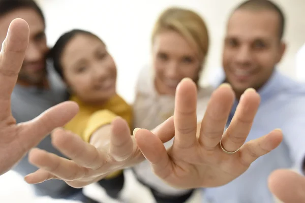 People showing fingers to camera — Stock Photo, Image