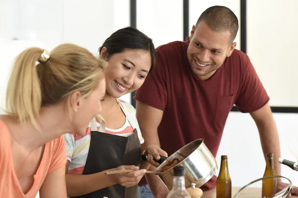 Friends having fun cooking — Stock Photo, Image