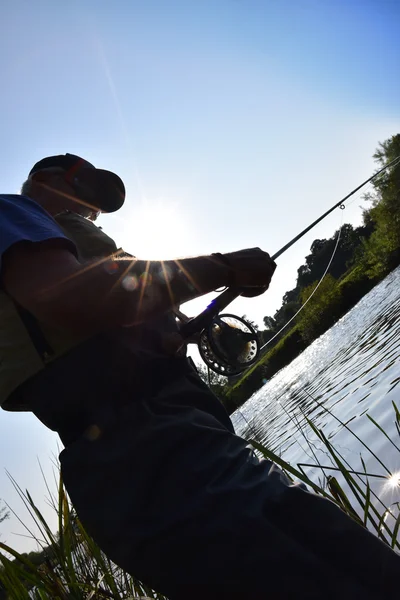 Fisherman fishing  in river — Stock Photo, Image