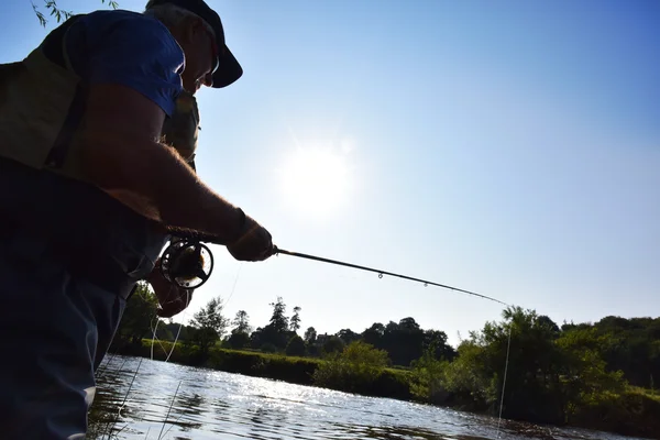 Fisherman fishing  in river — Stock Photo, Image