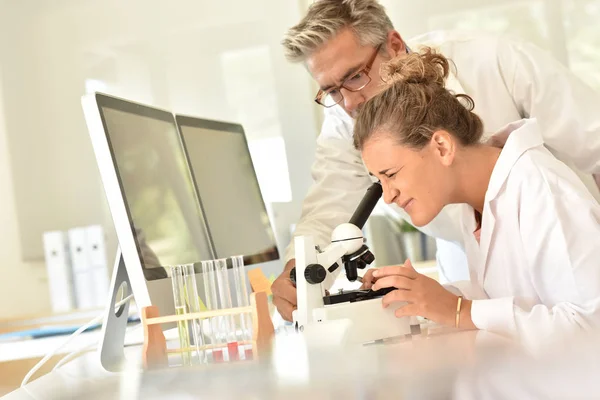 Student and teacher in g course — Stock Photo, Image