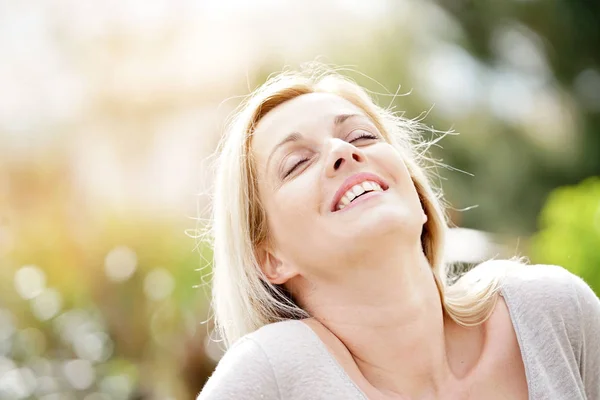 Attractive  blond woman posig — Stock Photo, Image