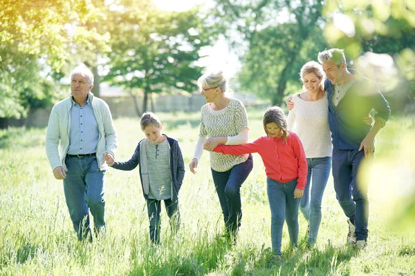 Happy family walking — Stock Photo, Image