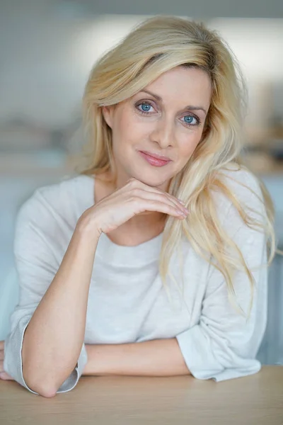 Cheerful middle-aged blond woman — Stock Photo, Image