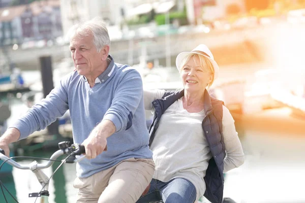 Couple having fun riding bike — Stock Photo, Image