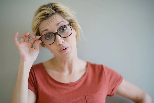 Blond woman with eyeglasses — Stock Photo, Image