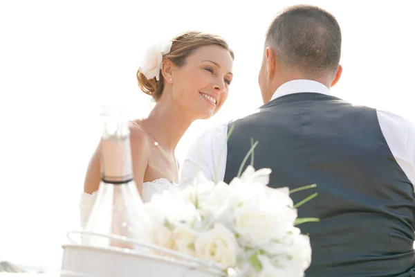 Bride and groom with champagne Stock Image
