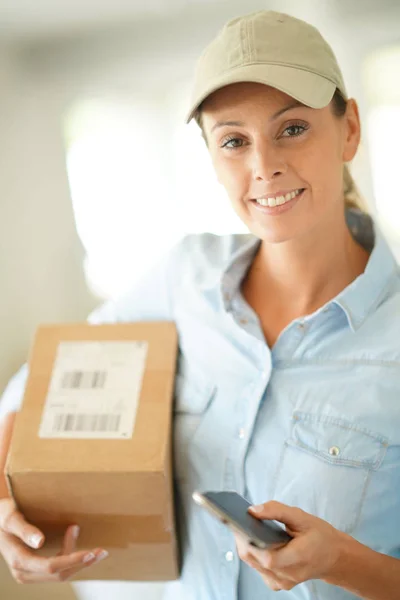 delivery woman holding package