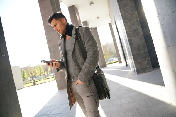 Trendy businessman walking — Stock Photo, Image