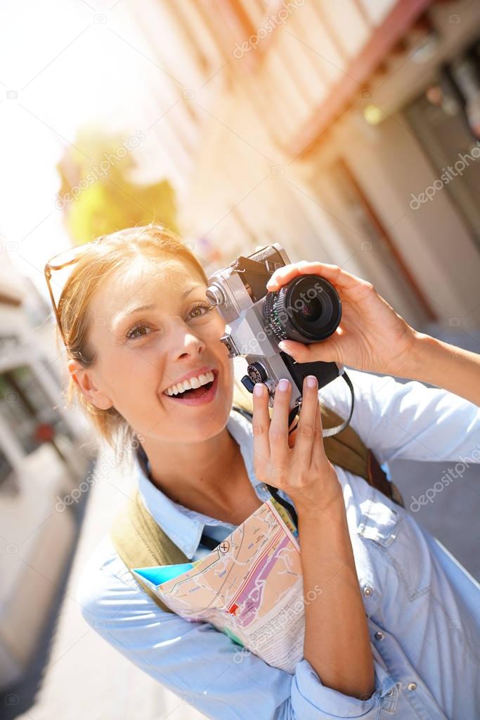 Portrait of tourist taking picture 