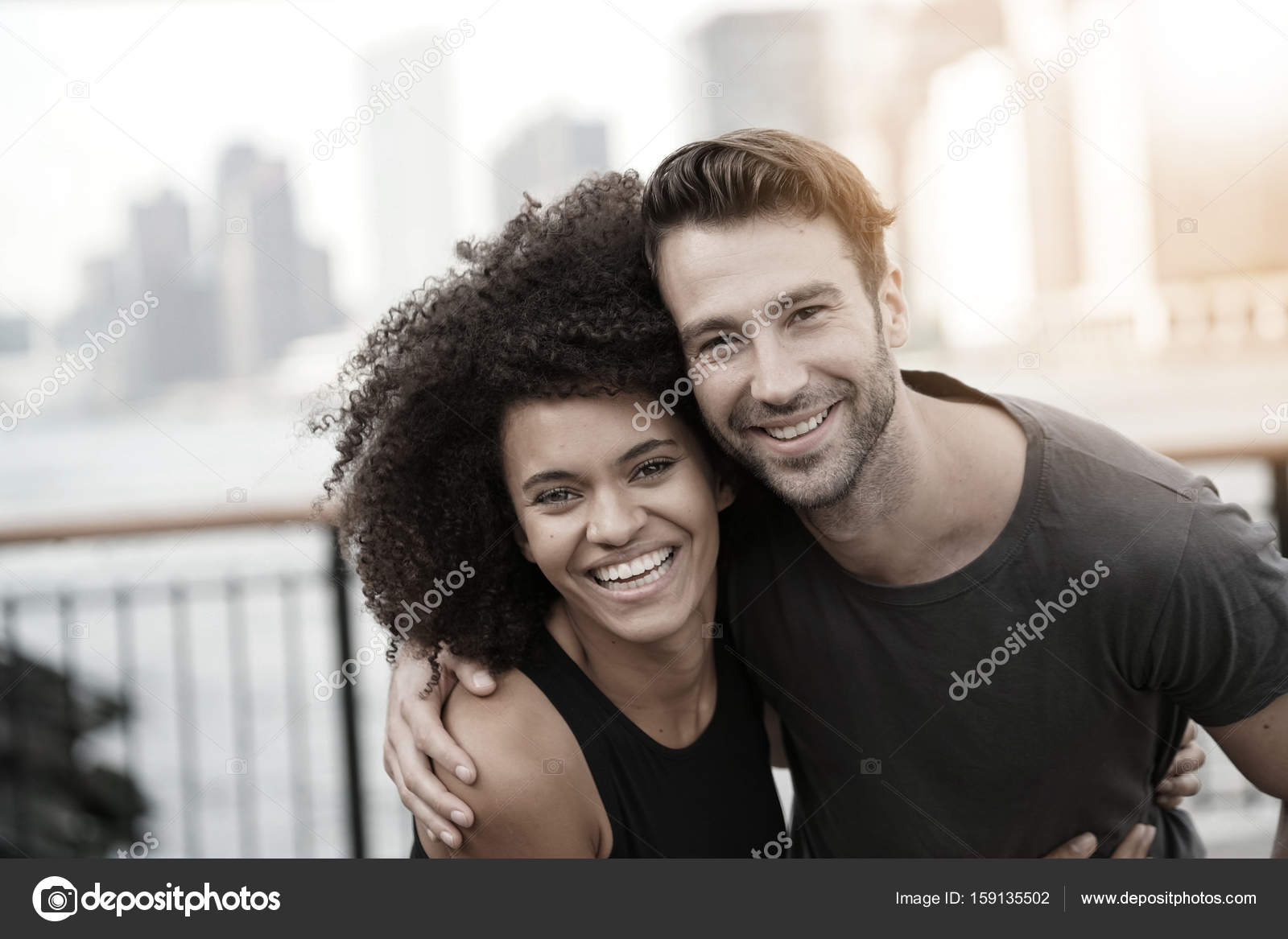 Couple in running outfit embracing Stock Photo by ©Goodluz 159135502