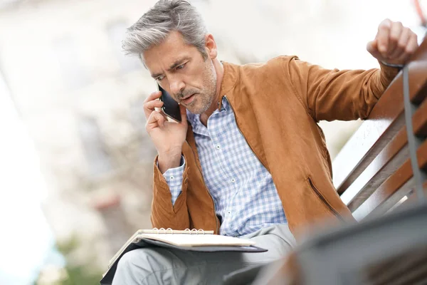 Businessman scheduling working day — Stock Photo, Image