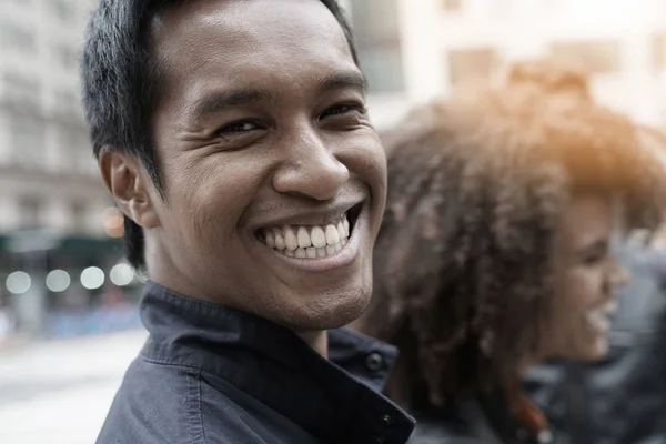 Portrait of cheerful guy laughing outloud