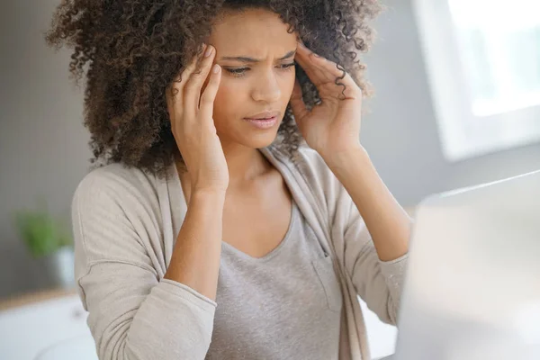 Mixed race woman having a headache — Stock Photo, Image