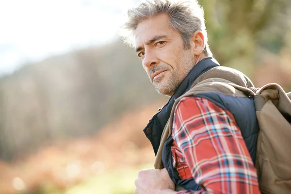 Hiker  walking in the mountains — Stock Photo, Image